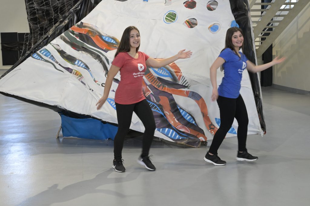 Children dancing indoors during RAXA Fitness Kids™