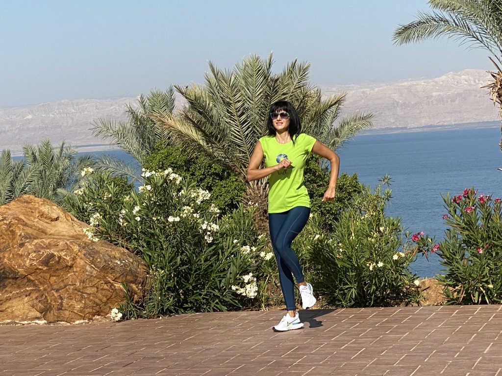 Woman doing outdoor walking by the sea
